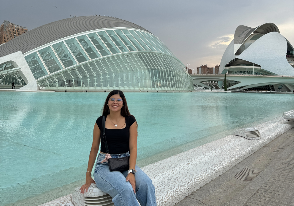 trine student smiles while studying abroad