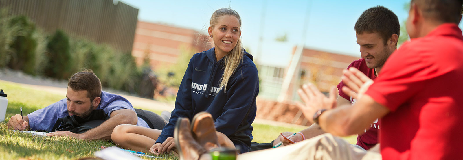 Students talking on patio