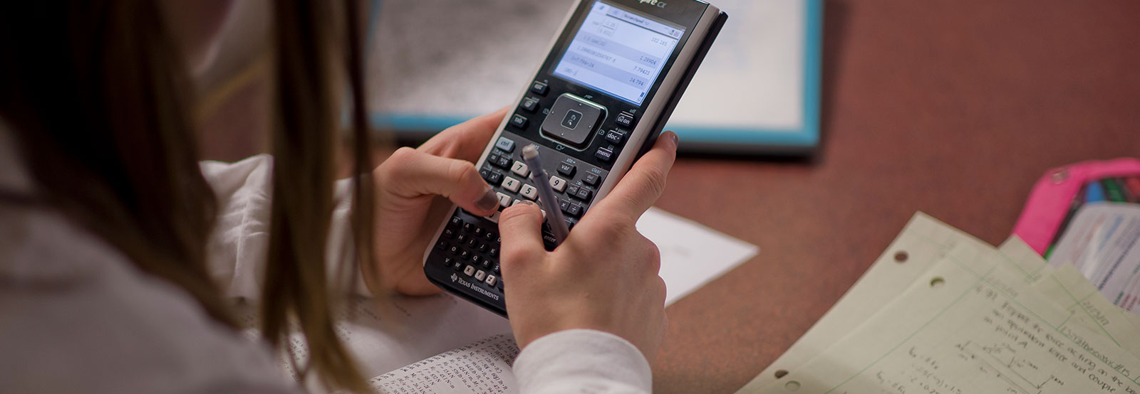 student using calculator